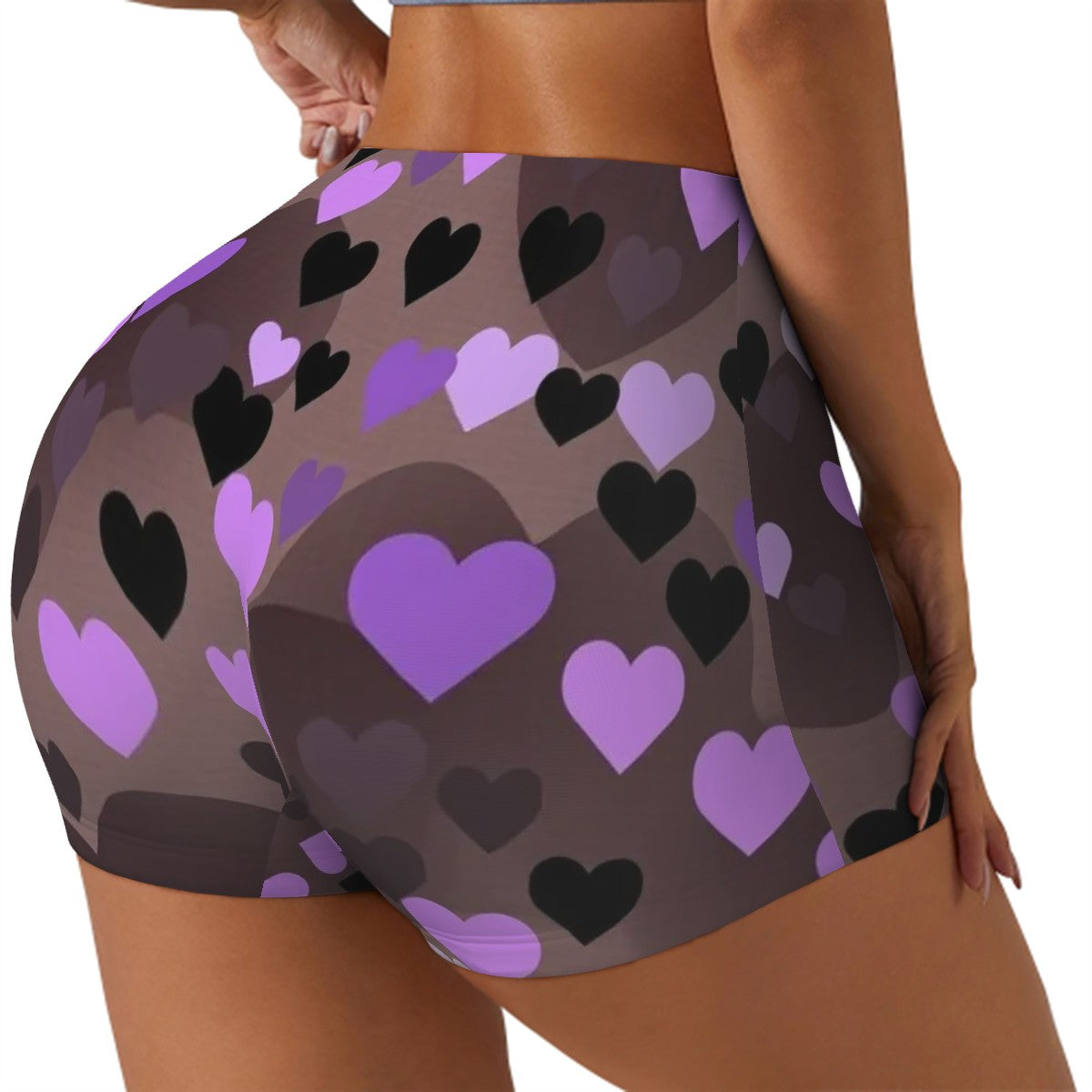 Sweetie's Collection women's athletic shorts with a black and purple heart geometric pattern.