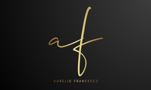 Aurelio Francesco black and gold geometric spaghetti strap bodycon dress with V-collar.